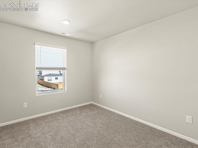 view of carpeted spare room