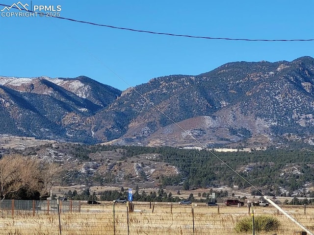 property view of mountains with a rural view