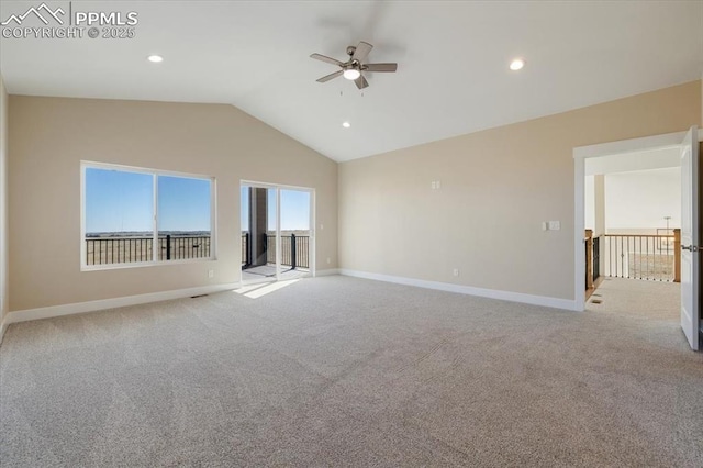 unfurnished living room featuring lofted ceiling, light carpet, and ceiling fan