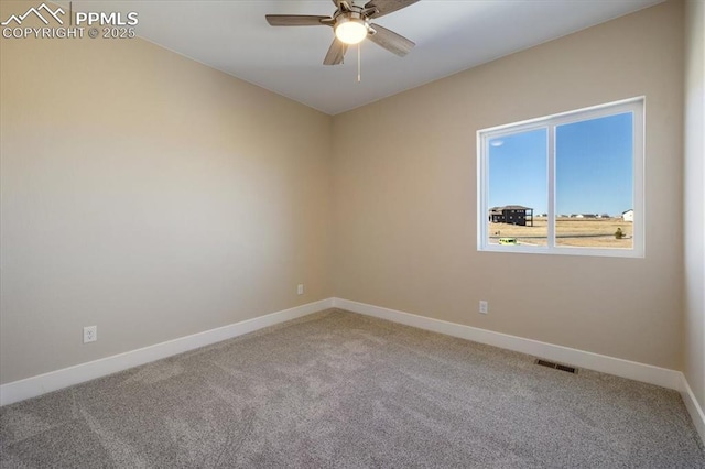 empty room with carpet floors and ceiling fan