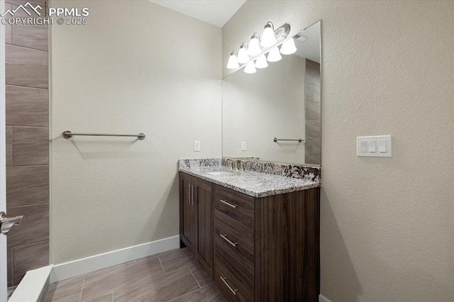 bathroom with vanity and tile patterned floors