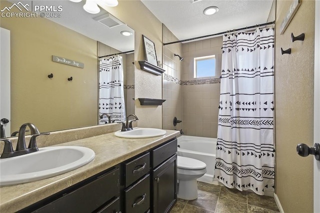 full bathroom featuring toilet, vanity, and shower / bath combination with curtain