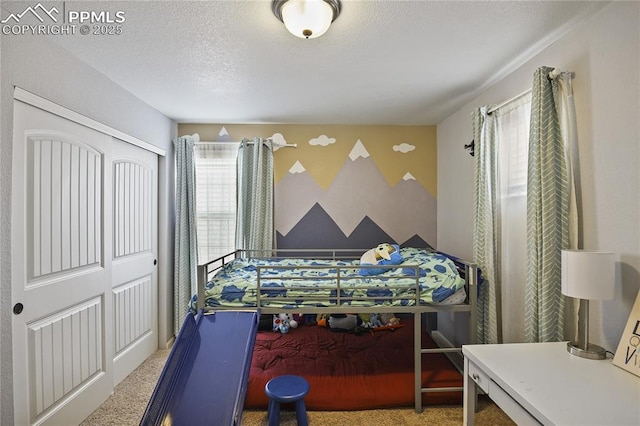 carpeted bedroom with a closet