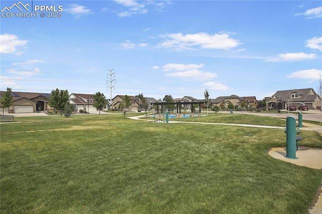 view of home's community with a gazebo and a lawn