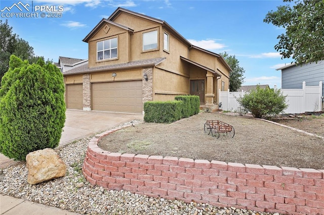 view of front of home featuring a garage