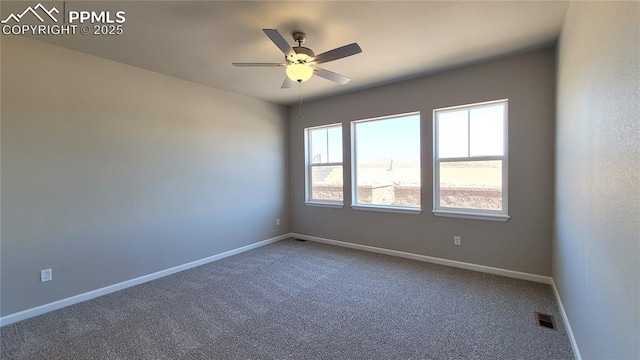 empty room featuring carpet and ceiling fan