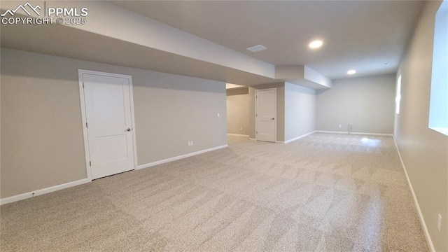 basement with light colored carpet