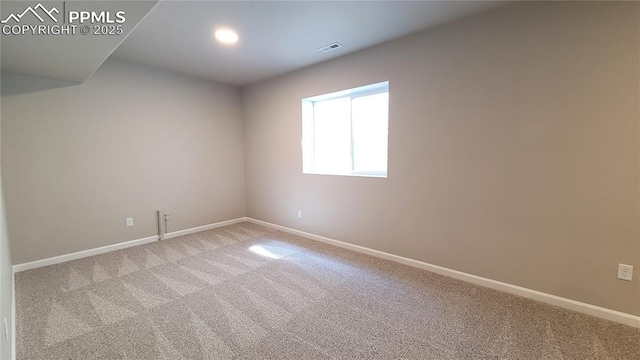 view of carpeted spare room