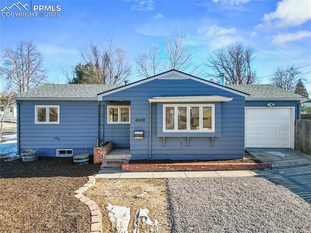 single story home with a garage