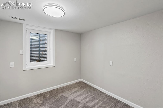 view of carpeted spare room