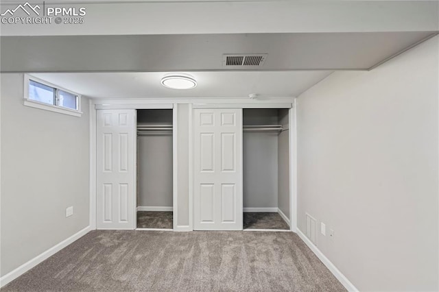 unfurnished bedroom with carpet flooring