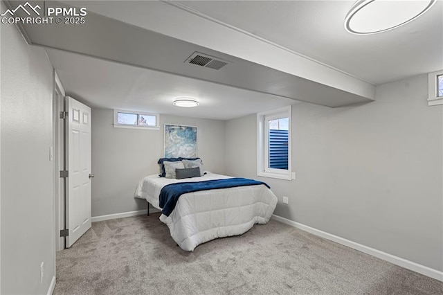 bedroom with light carpet