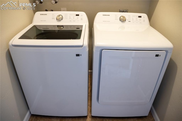 washroom featuring washing machine and dryer