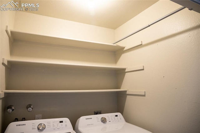 laundry area featuring washing machine and dryer