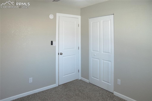 unfurnished bedroom featuring carpet floors