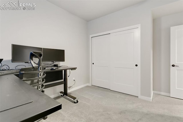 office area with carpet flooring and baseboards