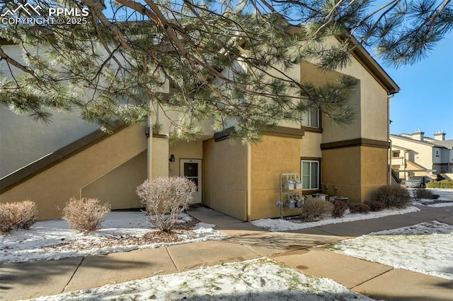 view of snow covered property