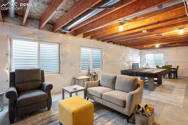 interior space with billiards and concrete flooring