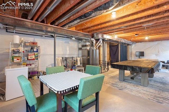 basement featuring pool table and fridge