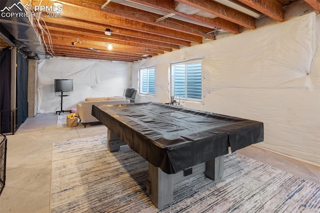 game room with concrete floors and pool table