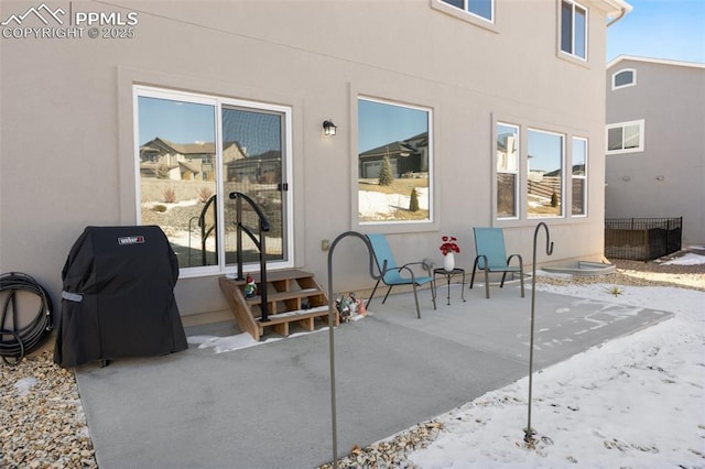 view of patio featuring a grill