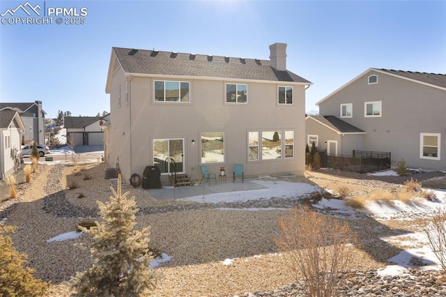 rear view of house featuring a patio