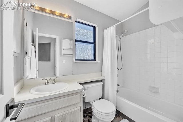 full bathroom featuring vanity, toilet, and shower / bath combo with shower curtain