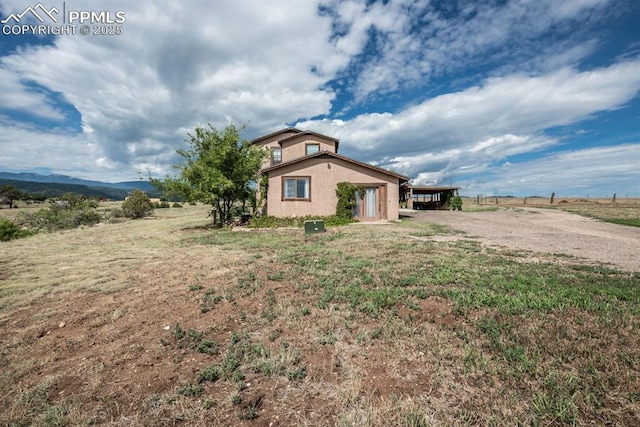 exterior space with a rural view