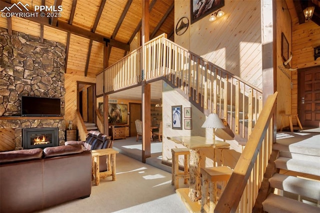 living room featuring high vaulted ceiling, a fireplace, wood ceiling, and beam ceiling