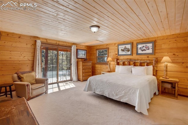 bedroom featuring wood ceiling, wooden walls, carpet floors, and access to exterior