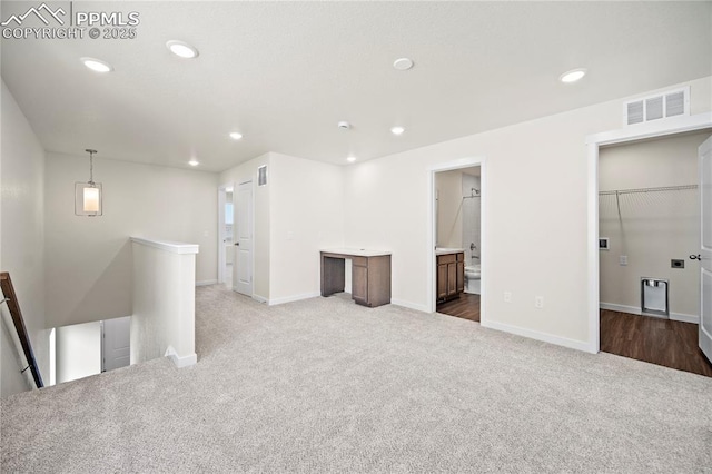 unfurnished room with carpet floors