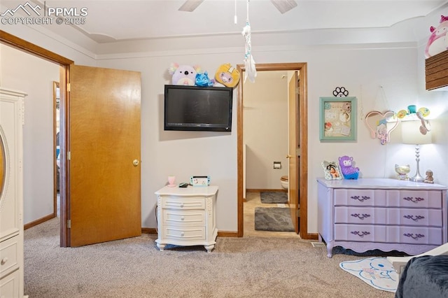 carpeted bedroom with ceiling fan