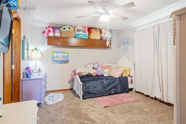 carpeted bedroom with ceiling fan and crown molding