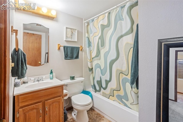 full bathroom with tile patterned flooring, shower / bath combination with curtain, vanity, and toilet