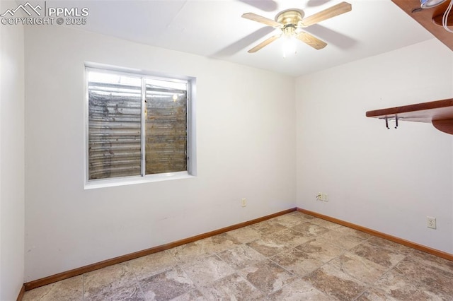 unfurnished room with ceiling fan