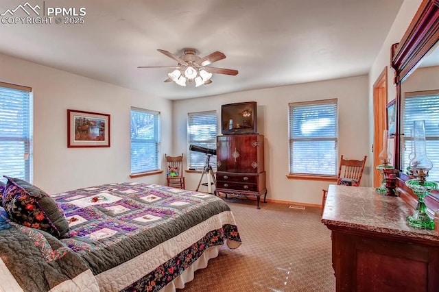 carpeted bedroom featuring ceiling fan