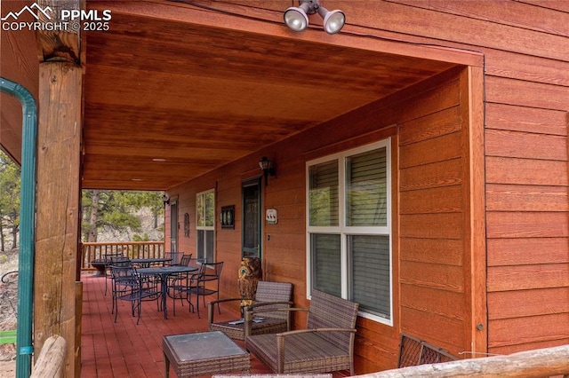 wooden deck with a porch