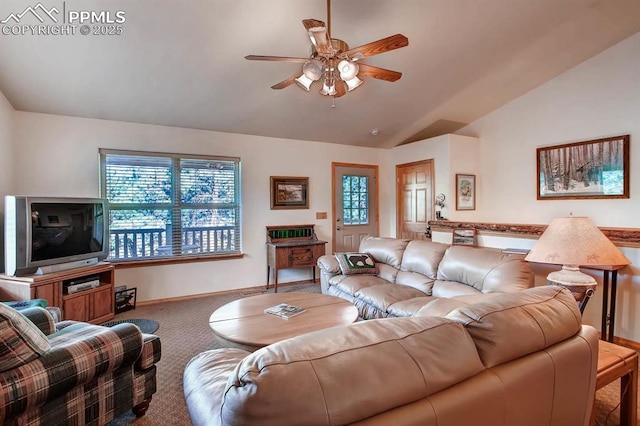 living room with ceiling fan, lofted ceiling, and carpet flooring