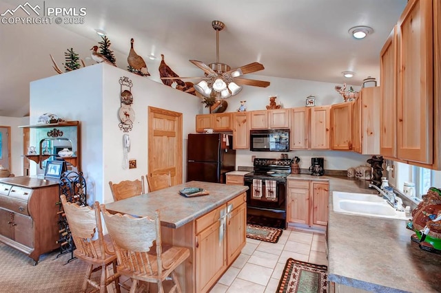 kitchen featuring vaulted ceiling, light brown cabinetry, light tile patterned floors, ceiling fan, and black appliances