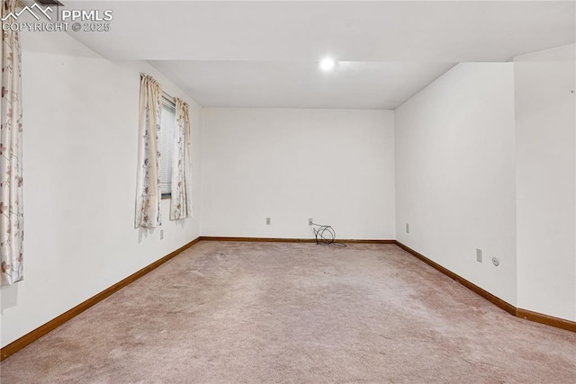 unfurnished room with carpet flooring