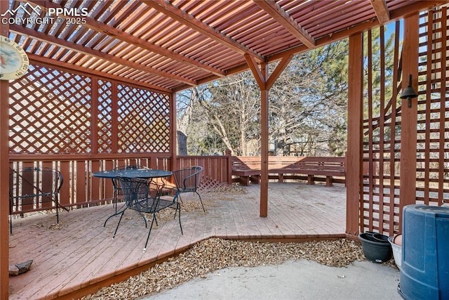 wooden deck featuring a pergola