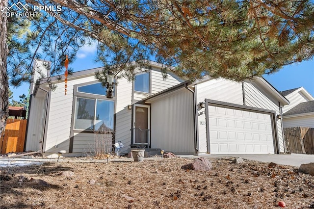 view of front of property with a garage