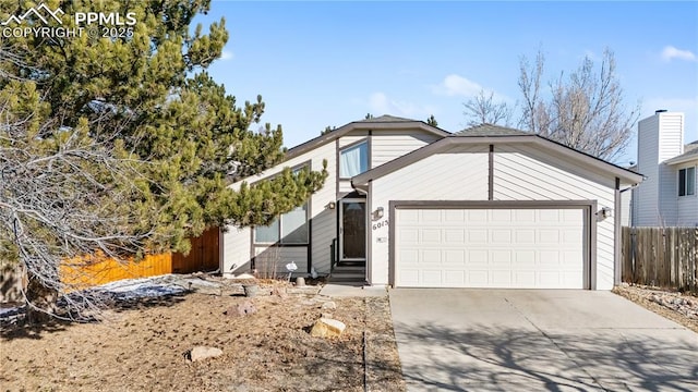 view of front of property with a garage