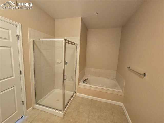 bathroom with separate shower and tub