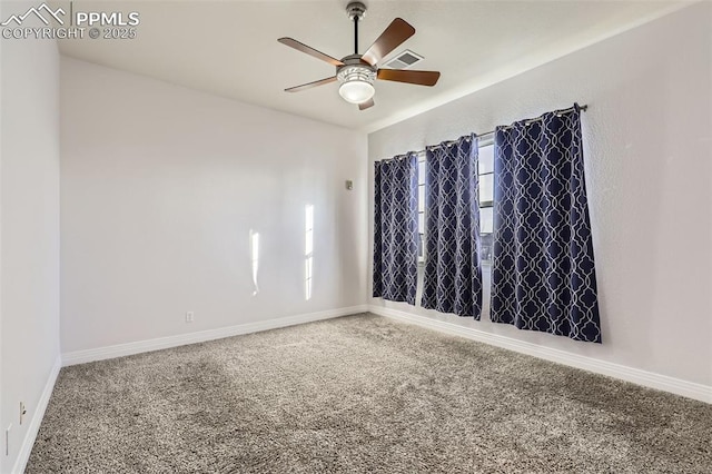 spare room featuring carpet floors and ceiling fan