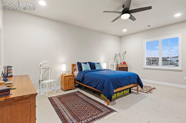 bedroom with ceiling fan and carpet