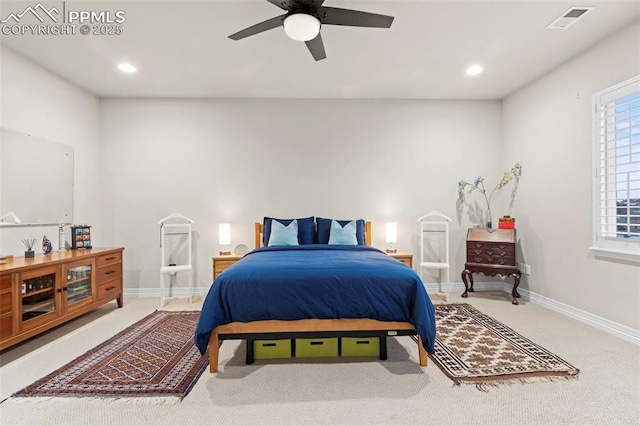 carpeted bedroom featuring ceiling fan