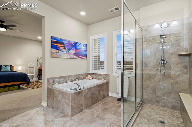 bathroom featuring separate shower and tub and ceiling fan