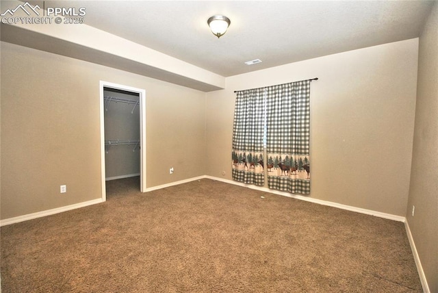 view of carpeted spare room