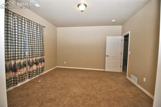 view of carpeted spare room